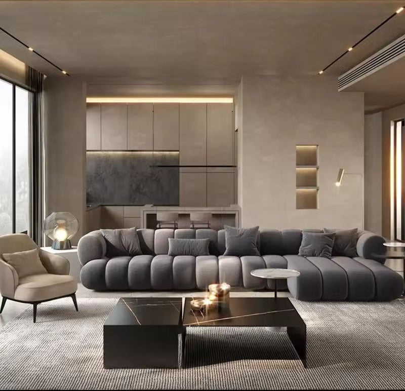 Modern living room with a gray sectional sofa, armchair, and coffee table. ATUNUS American Large Velvet Home Furniture Nordic Modern L Shape Corner Living Room Modular Sectional Sofa Couch Set LOVESEAT GREY BLACK SOFA