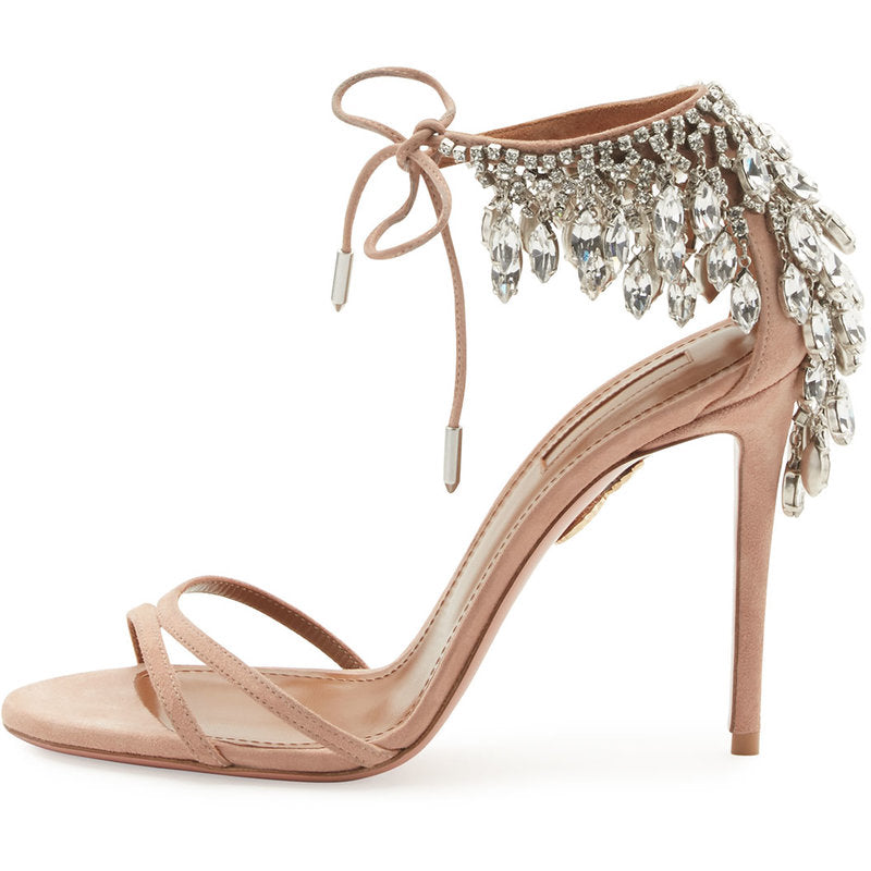 Beige high-heeled sandal with crystal embellishments on a white background