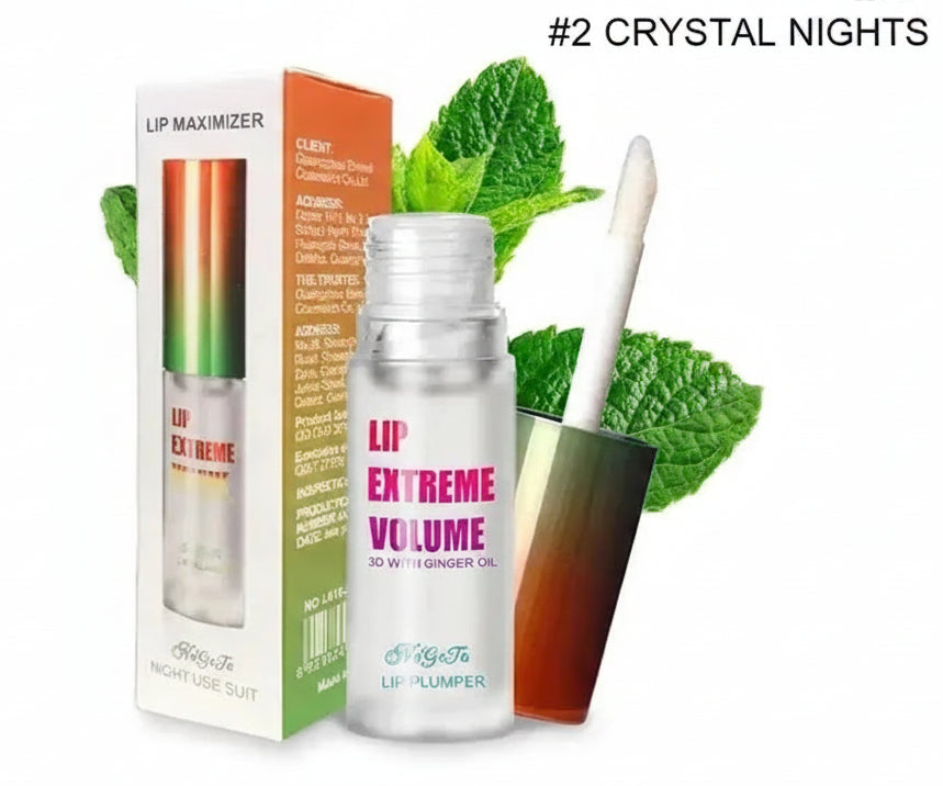 Lip plumper with packaging, applicator, and green leaves on a white background