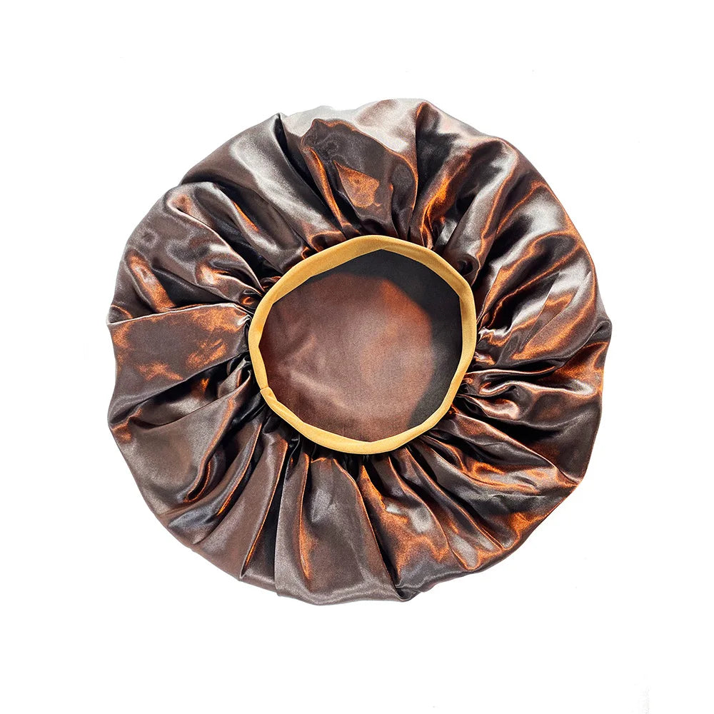 Brown satin hair bun cover on a white background