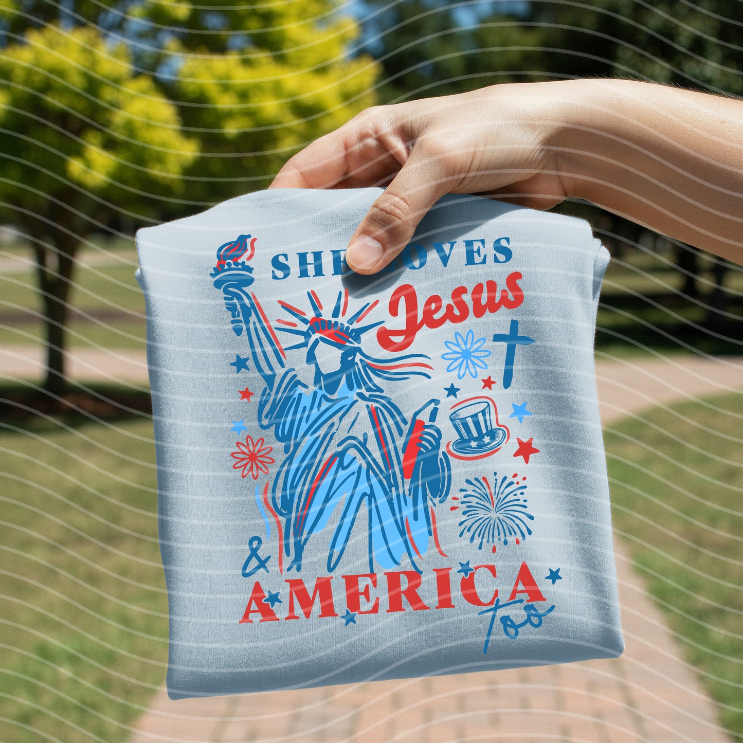She Loves Jesus and America Too Graphic Tee