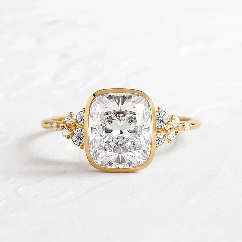 1.0–3.0CT Cushion Cut Lab Grown Diamond Ring in 9K/14K/18K Yellow Gold – Vintage Bezel Wedding Ring for Women

Timeless vintage charm meets modern, ethical luxury. This cushion cut lab grown diamond ring is designed for the woman who loves classic elegance with a distinctive, heirloom-inspired twist. Framed in a smooth bezel setting of rich yellow gold, the diamond appears luminous and secure, making it perfect for everyday wear, engagements, or a meaningful anniversary gift.

Available in 1.0–3.0 carats