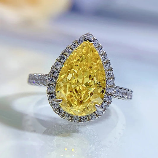 14k Gold 3.5ct Moissanite Jewelry Diamond Ring A bold, architectural silhouette with a “camera-flash” kind of brilliance. Your 3.5ct center stone is held in a precision claw setting designed to maximize light return—finished with 0.35ct of side accents that make the whole ring glow like it has its own spotlight.