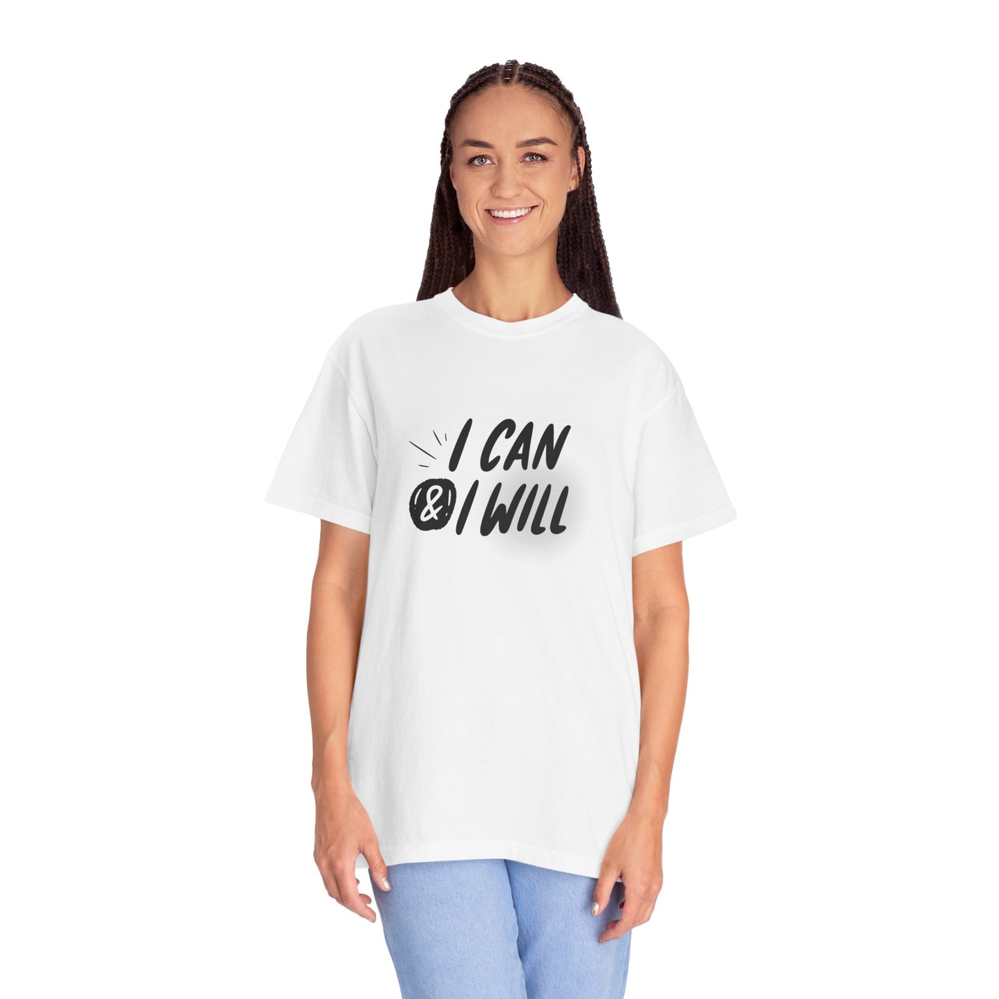 A woman modeling a white short-sleeve graphic T-shirt with the text 'I CAN & I WILL' printed in black across the chest, paired with light blue jeans against a plain white background.