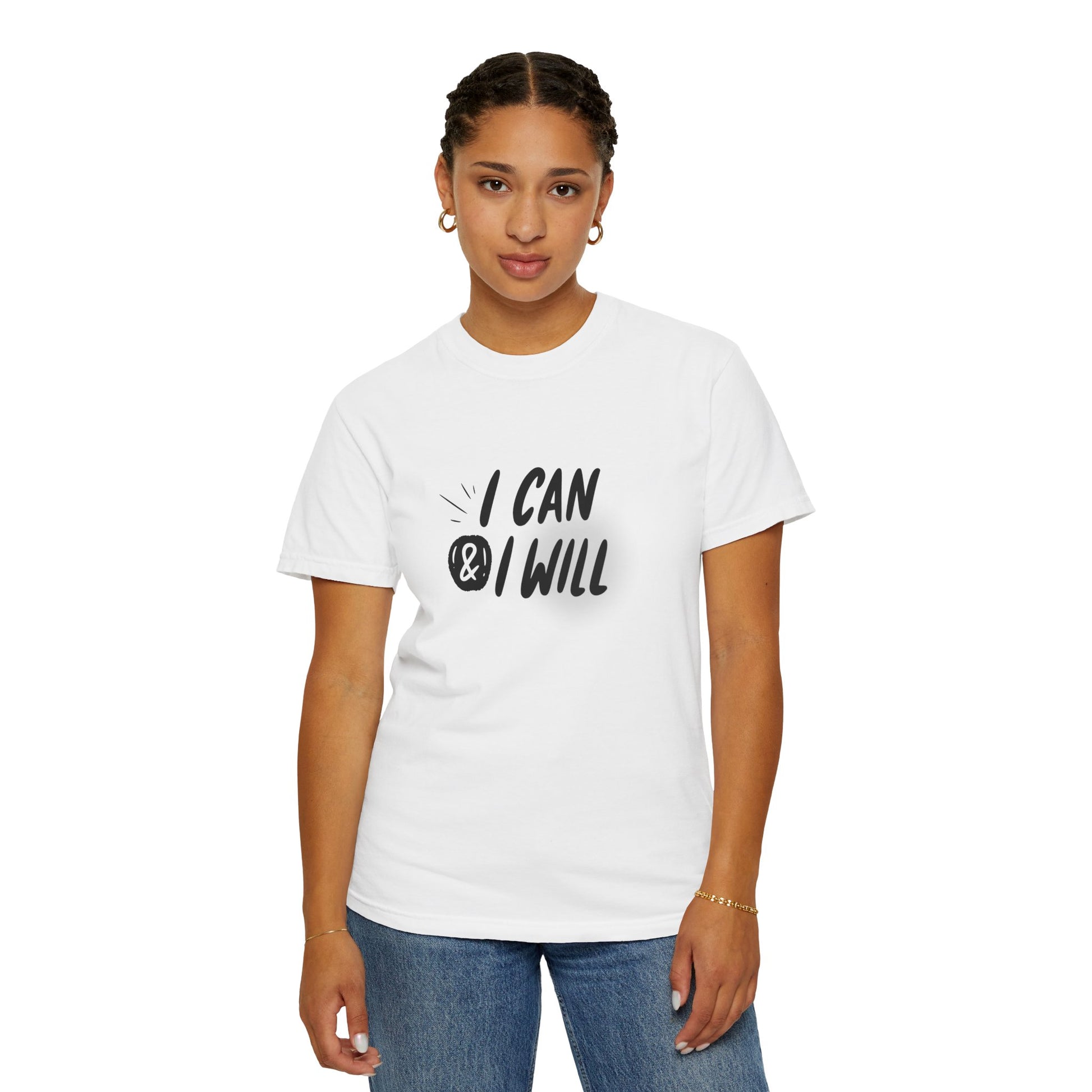 Person wearing a white t-shirt with an I CAN & I WILL graphic design on a plain background