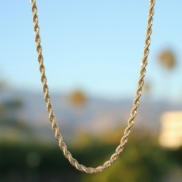 Elevate your everyday look with this timeless 4mm Rope Chain, crafted from sterling silver and coated in luxurious 18k gold plating. Designed with a classic twist pattern, this piece exudes sophistication and versatility.

18k Gold filled Rope Chain Necklace - 4mm
Features:
* Material:  Sterling silver with 18k gold plating
* Thickness: 4mm
* Length: 24 inches
* Weight: 50 grams
Perfect for wearing alone or layering with other chains, durable and stylish piece 