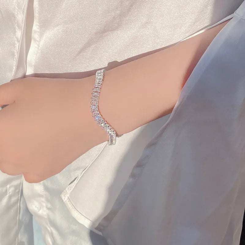 Close-up of a person wearing a silver bracelet on a light background. 1 Piece 925 Sterling Silver Geometric 925 sterling silver box chain Bracelets