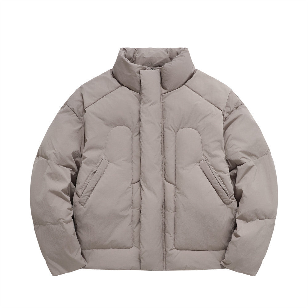 Light gray men's oversized puffer jacket with stand collar, hidden zip closure, insulated quilted design, and slanted side pockets for winter warmth.