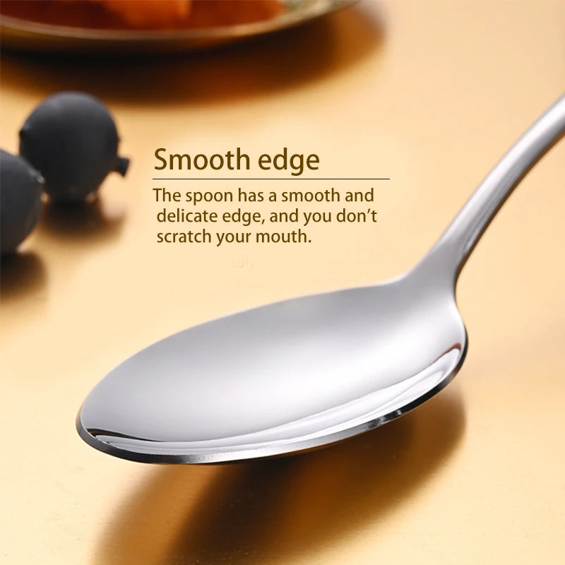 Silver spoon with smooth edge on a blurred background
