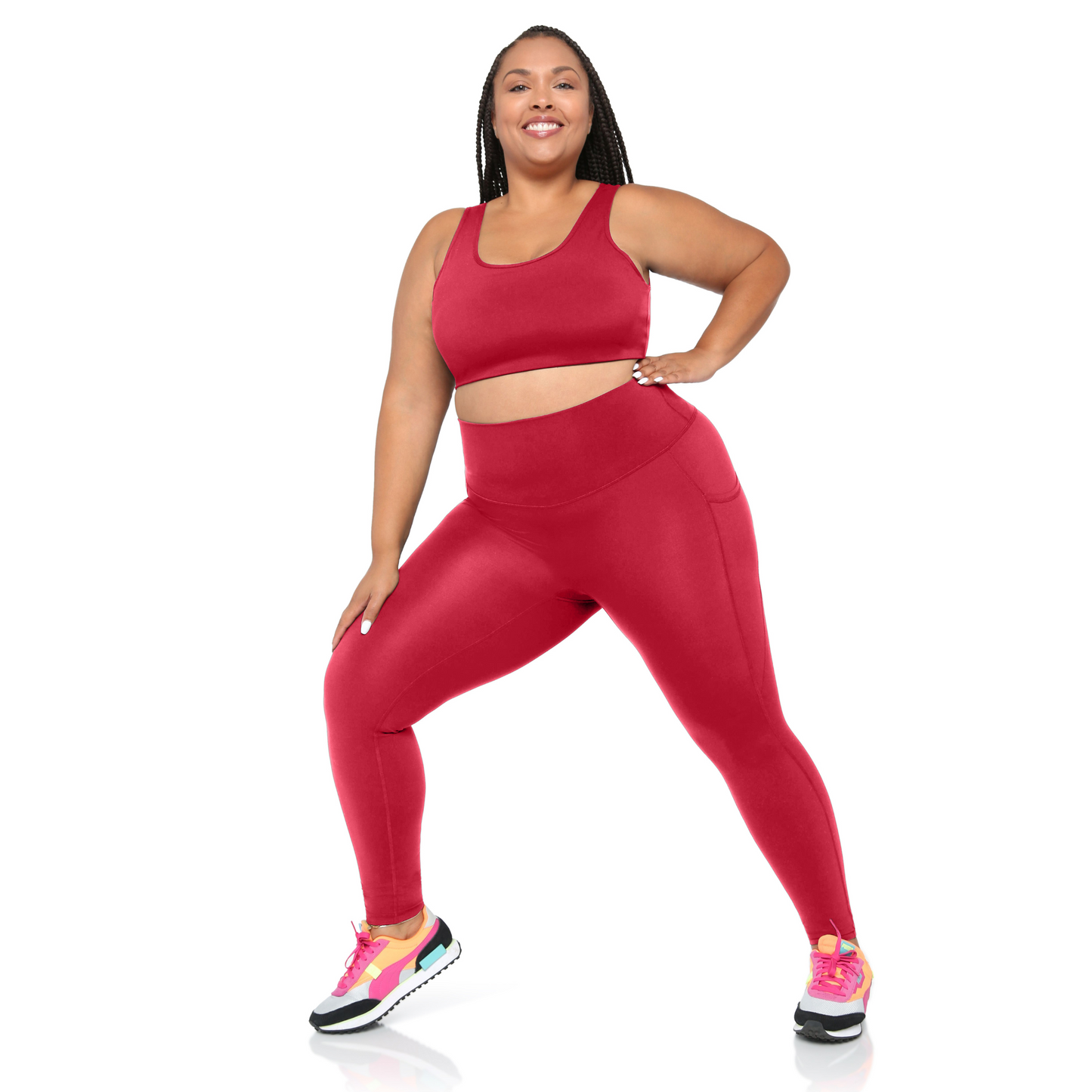 plus size Woman wearing a red athletic outfit on a white background