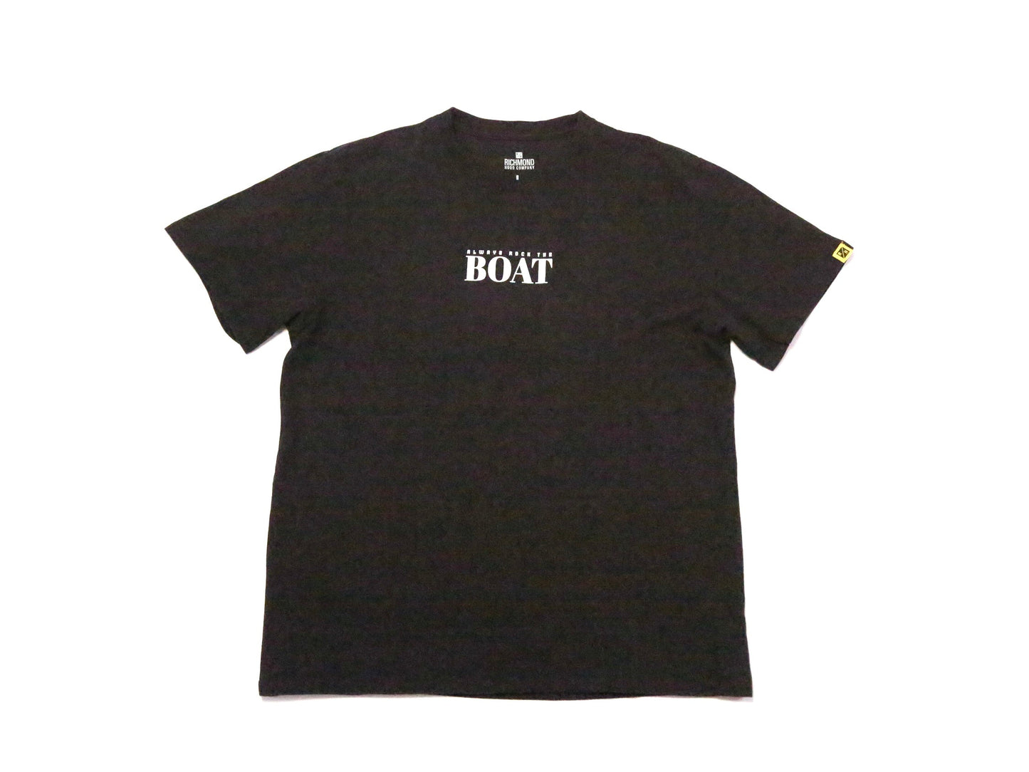 A black short-sleeve t-shirt with 'ALWAYS ROCK THE BOAT' printed in white across the chest, displayed flat against a plain white background.