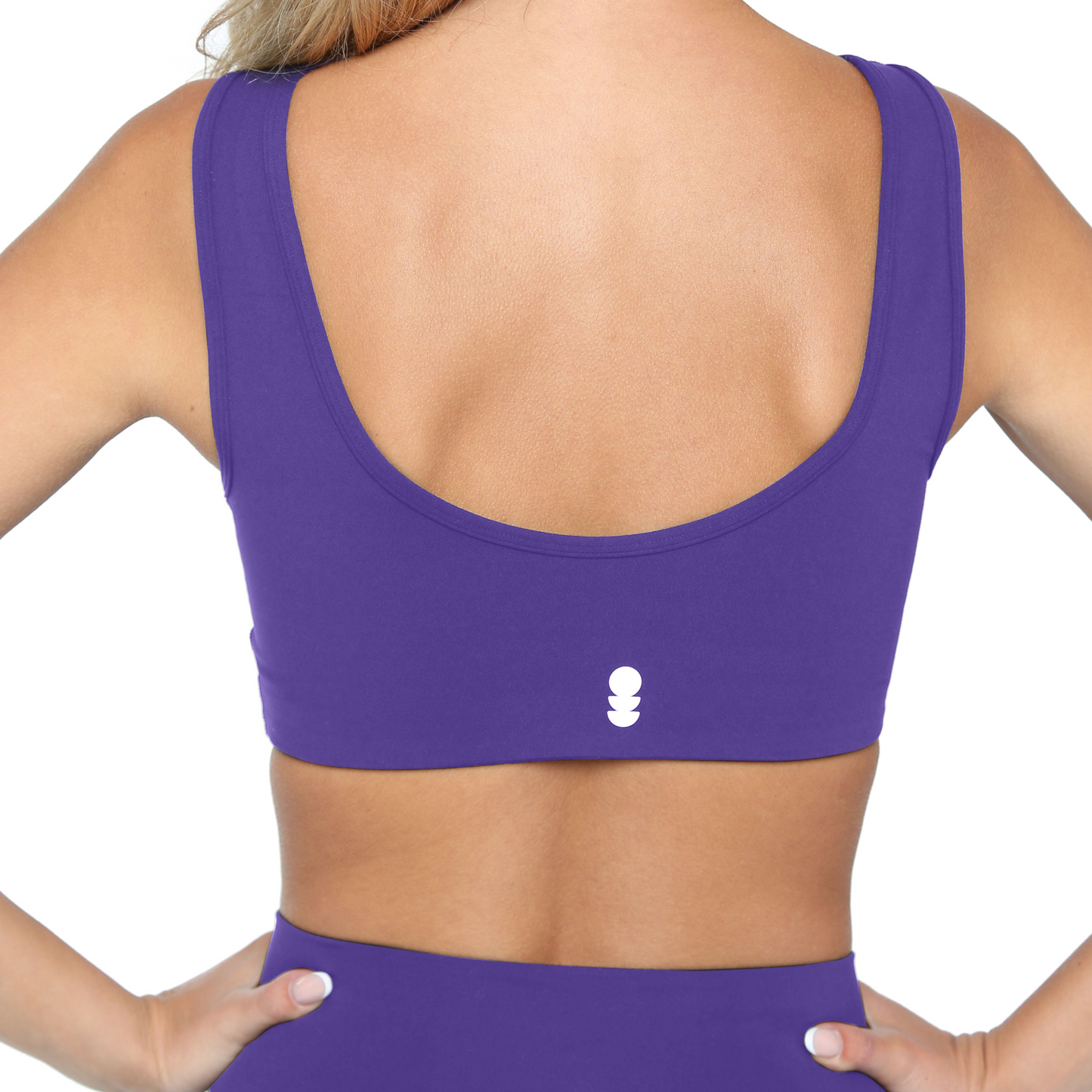 Purple sports bra with a logo on a white background