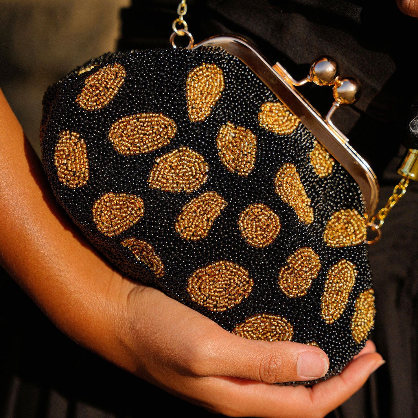 The Arnoldi Black Gold Hand-beaded Clutch In Black & Gold