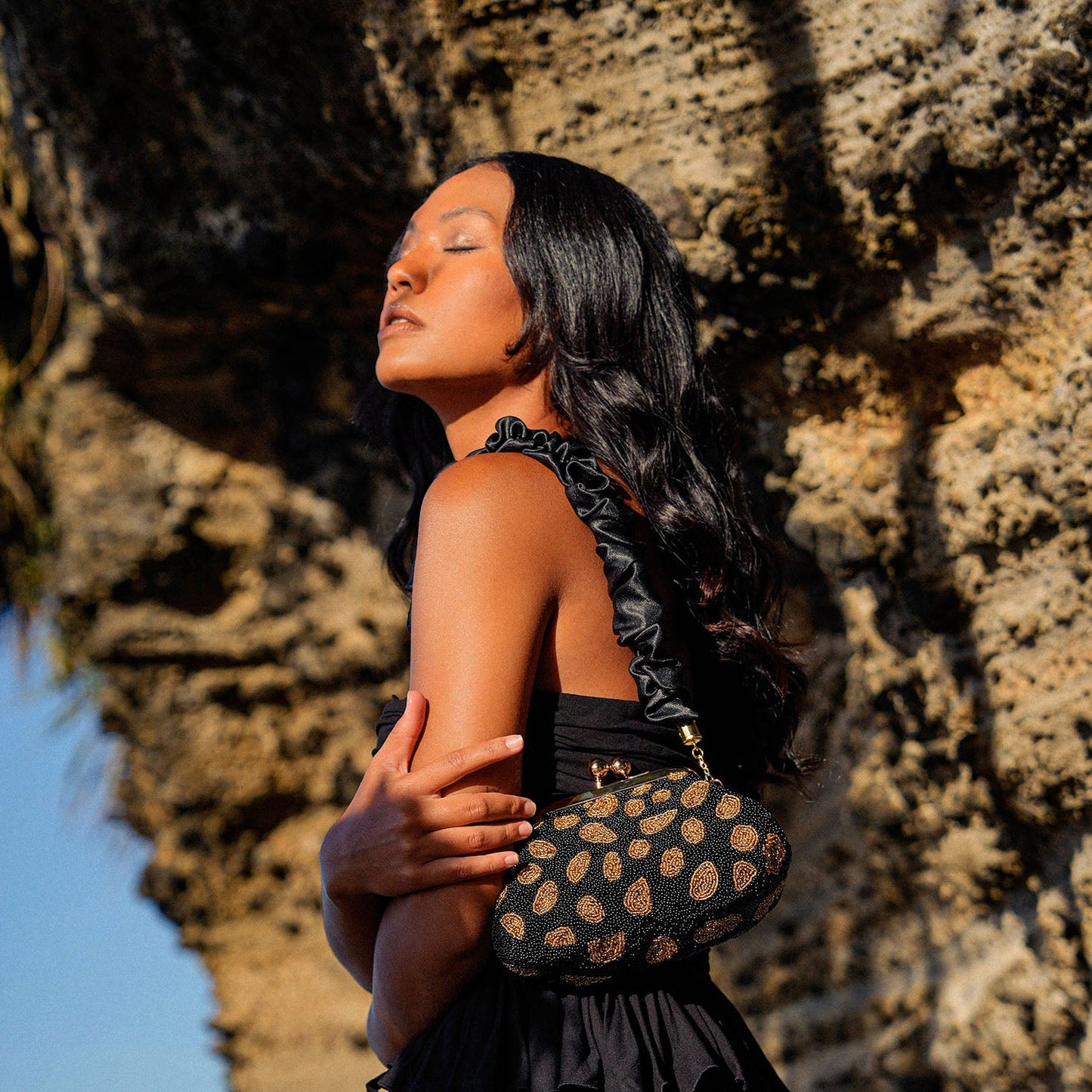 The Arnoldi Black Gold Hand-beaded Clutch In Black & Gold