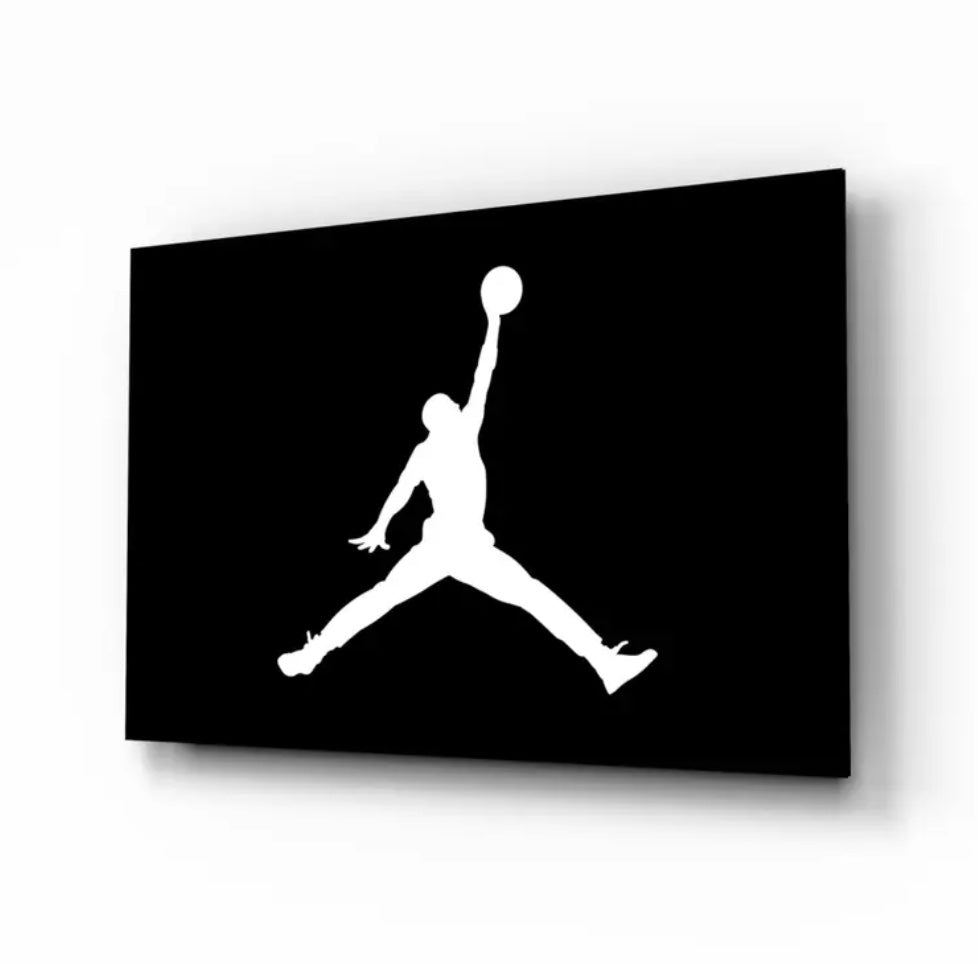 White silhouette of a person jumping with a basketball on a black background. Perfect for sneakerheads, basketball fans, sports rooms, man caves, teen lounges, and modern luxury decor.