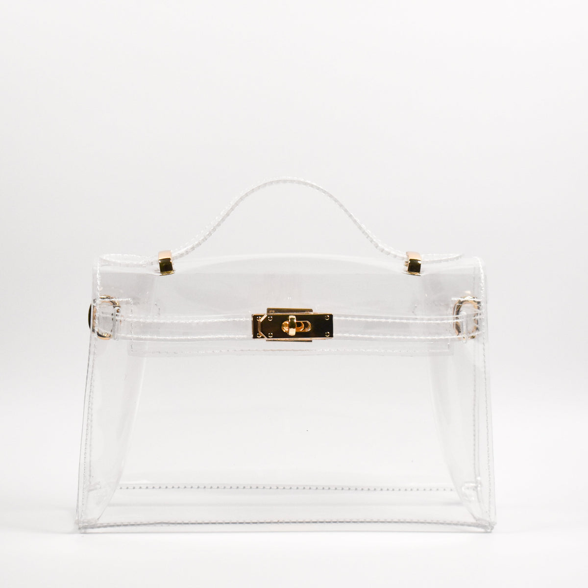 Clear handbag with gold accents on a white background
