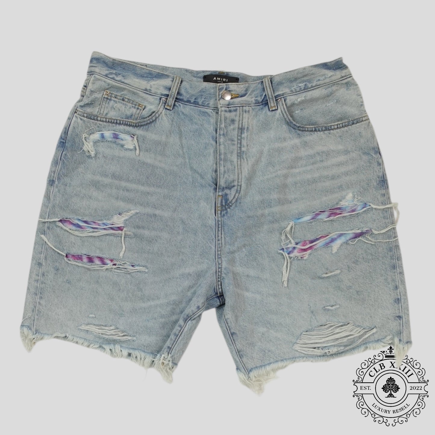 Amiri Tie Dye Thrasher Jean Shorts in Light Wash