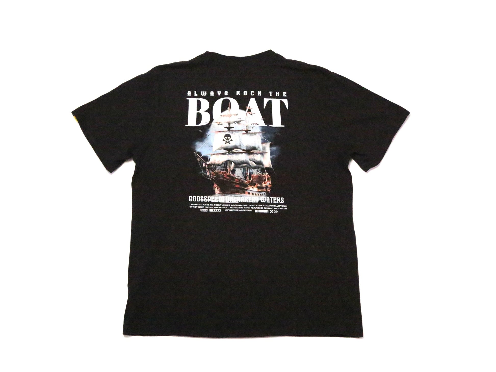 A black short-sleeve t-shirt with a large graphic print on the back, featuring the text 'ALWAYS ROCK THE BOAT' and a ship illustration, shown against a plain white background.