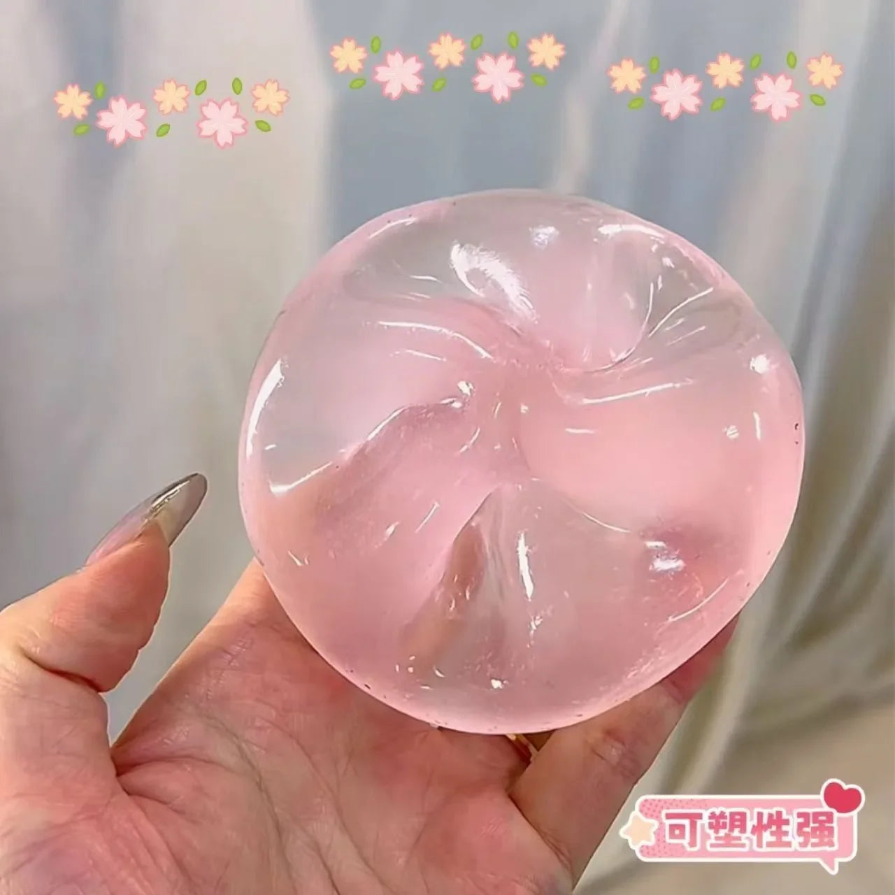 Blue translucent maltose squishy stress ball being squeezed in hand, slow rebound sensory fidget toy for anxiety relief, desk stress relief, tactile therapy, ASMR squeeze toy, soft jelly stress ball, reusable calming fidget gift