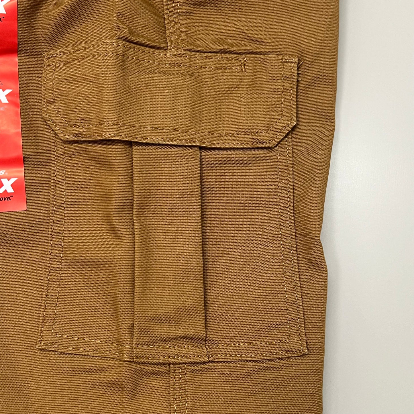 Brown pants with a pocket on a white background