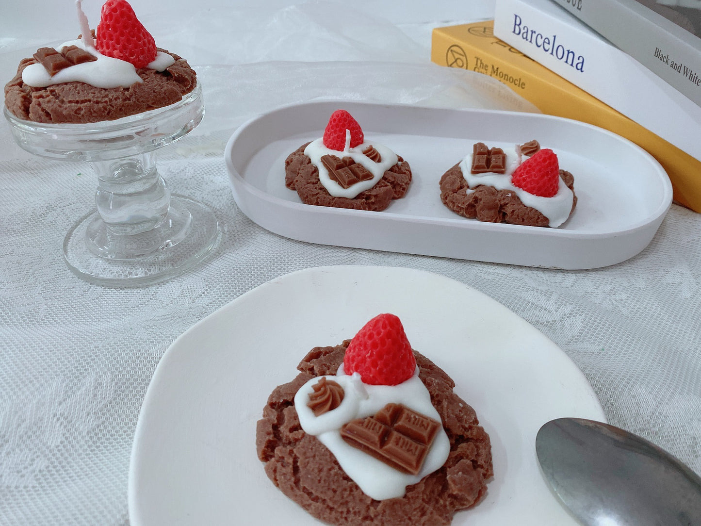 Chocolate desserts with whipped cream and raspberries on a white tablecloth. Handmade Strawberry Cake Aromatic Candle Decoration. Chocolate cookies with whipped cream and raspberries on a white plate. Indulge your senses with this delightful handmade strawberry cake aromatic candle! Crafted from eco-friendly soybean wax, this charming sector-shaped beauty fills your space with a sweet, bakery-fresh fragrance that's absolutely irresistible. 