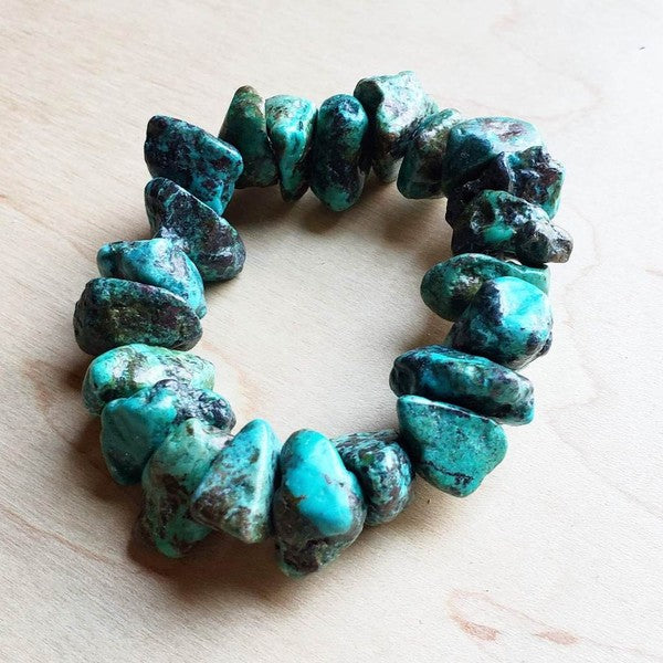 Chunky Natural Turquoise Bracelet

Bracelet Bar-
Create Your Own Stack
Mix and Match to create a look that's all your own!
Stretch beaded bracelet
made of chunks of genuine natural turquoise.
Size of beads will range in size from 1/2\" up to 3/4\"
Although your item will resemble the photo,
each piece is created by hand, so no two are identical.
