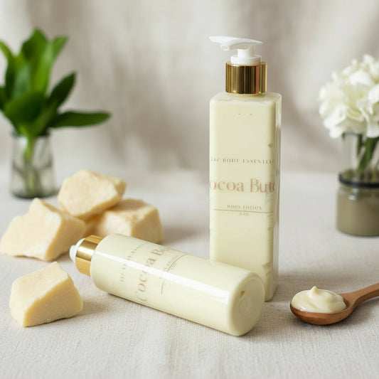 Cocoa Butter body lotion and soap bars on a neutral background with flowers and plants.