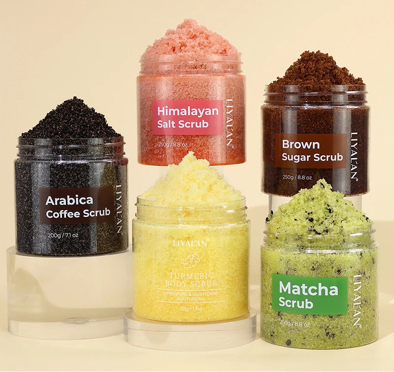 Collection of LIYALAN body scrubs in various flavors on a beige background