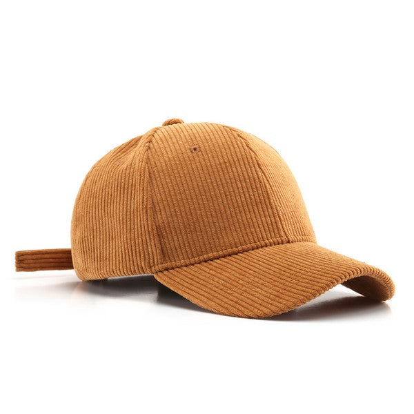 brown corduroy boyfriend baseball cap with a relaxed fit on a white background. adjustable cap.