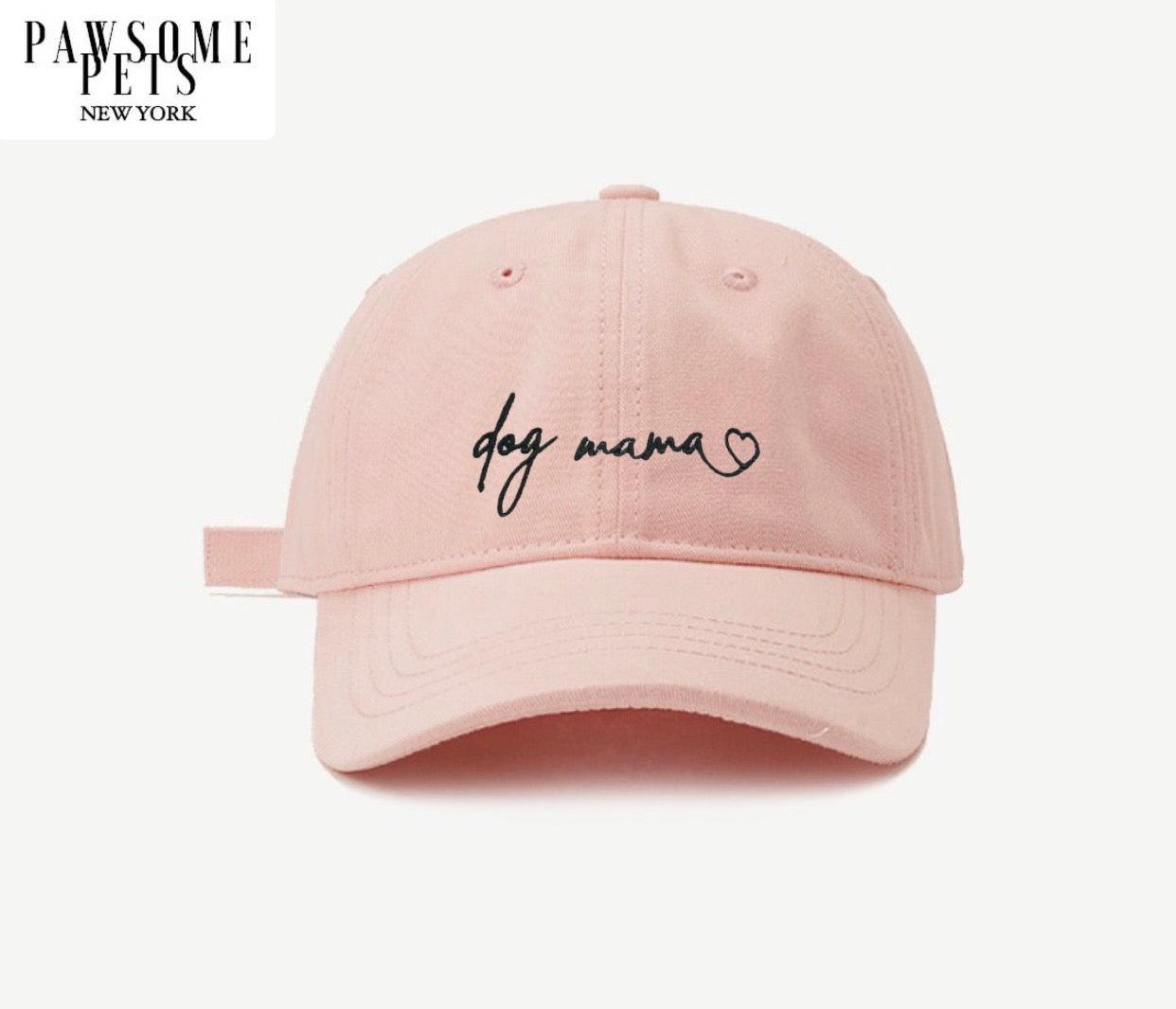 Pink cap with 'dog mama' text on a white background