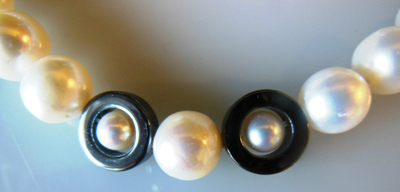 Hematite Circles and asymetric beads on white pearls-2