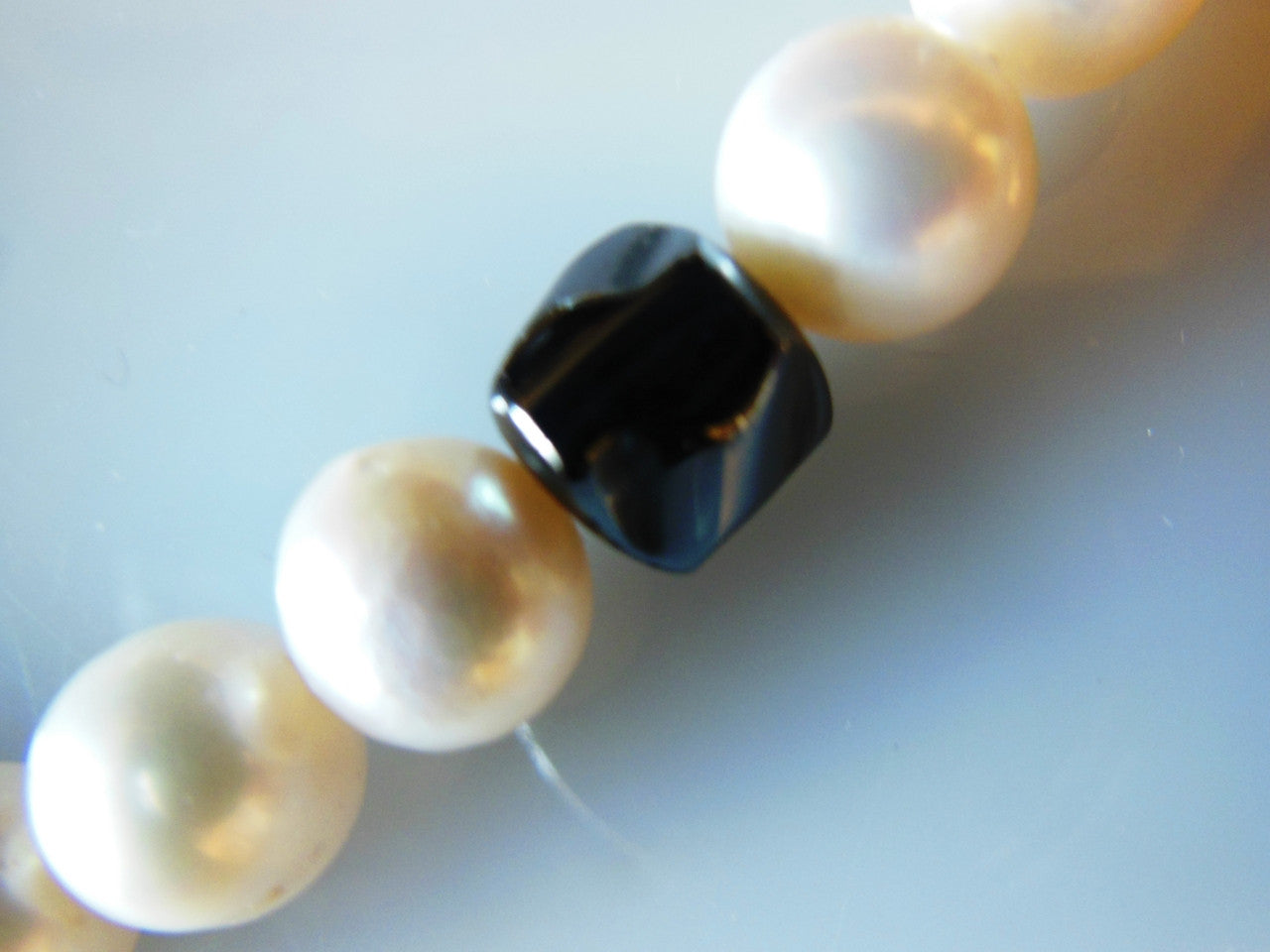 Hematite Circles and asymetric beads on white pearls-3