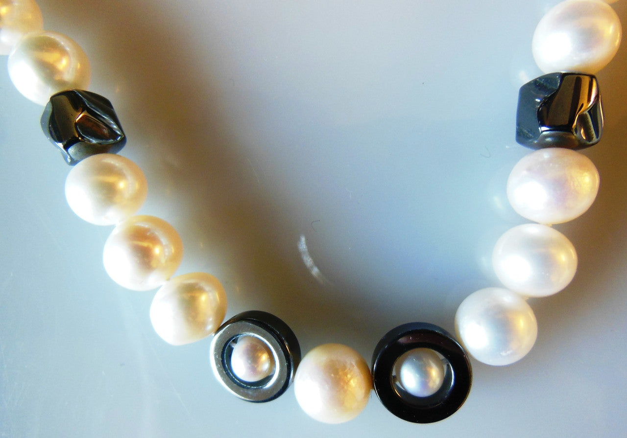 Hematite Circles and asymetric beads on white pearls-1