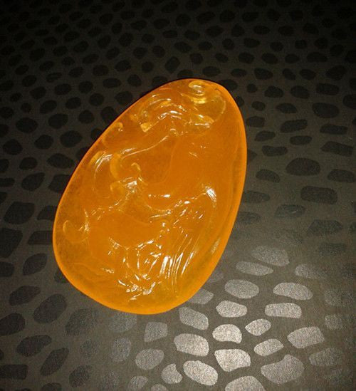 Jade Pendant- Carved golden jade from China.-0