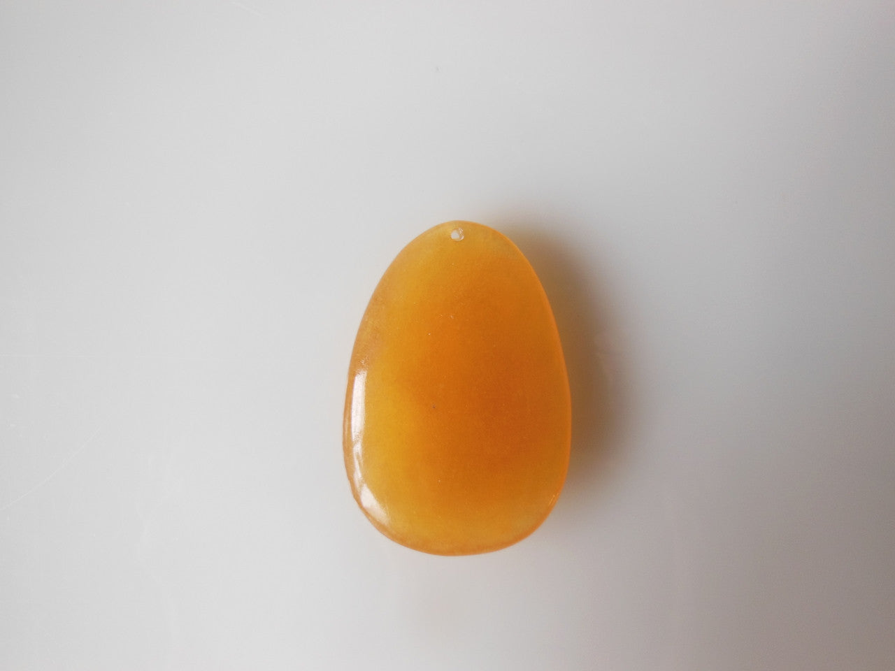 Jade Pendant- Carved golden jade from China.-1