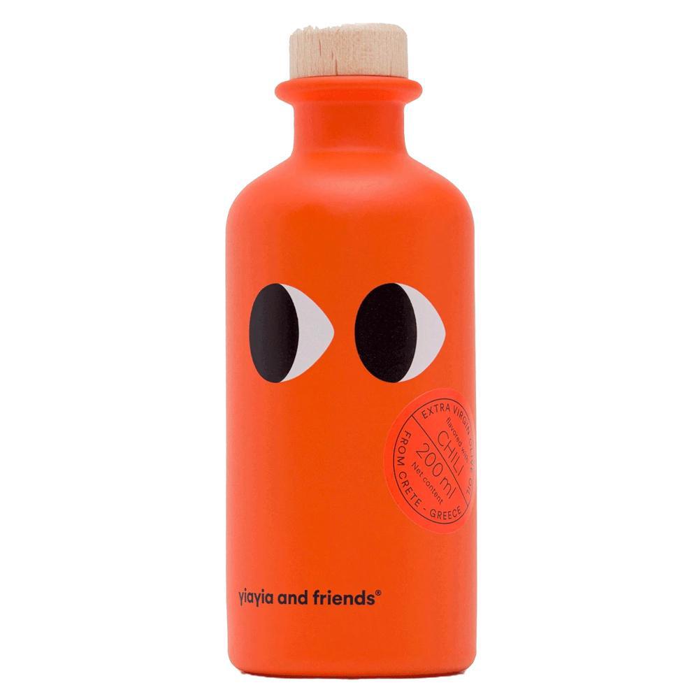 Orange bottle with black eye design on a white background