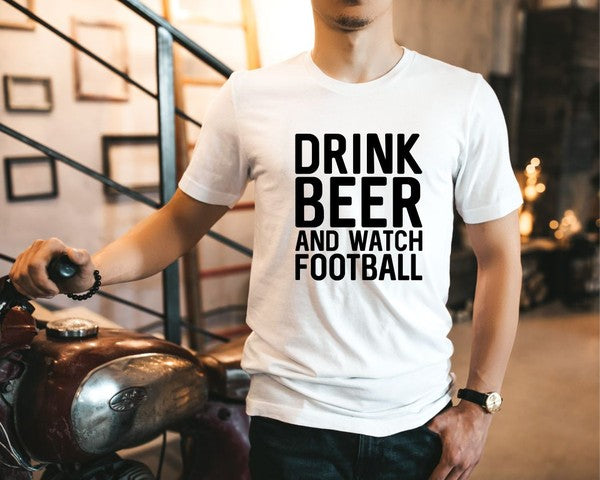 Man wearing a beige graphic t-shirt featuring the bold slogan “Drink Beer and Watch Football” in large black lettering. This premium unisex ring-spun cotton tee combines casual comfort with sports fan style, making it perfect for football season, tailgates, game day parties, sports bars, weekend gatherings, and everyday wear. Styled with dark jeans beside a vintage motorcycle, this soft cotton graphic shirt is an ideal gift for football fans, beer enthusiasts, sports lovers, husbands, boyfriends, dads, and 