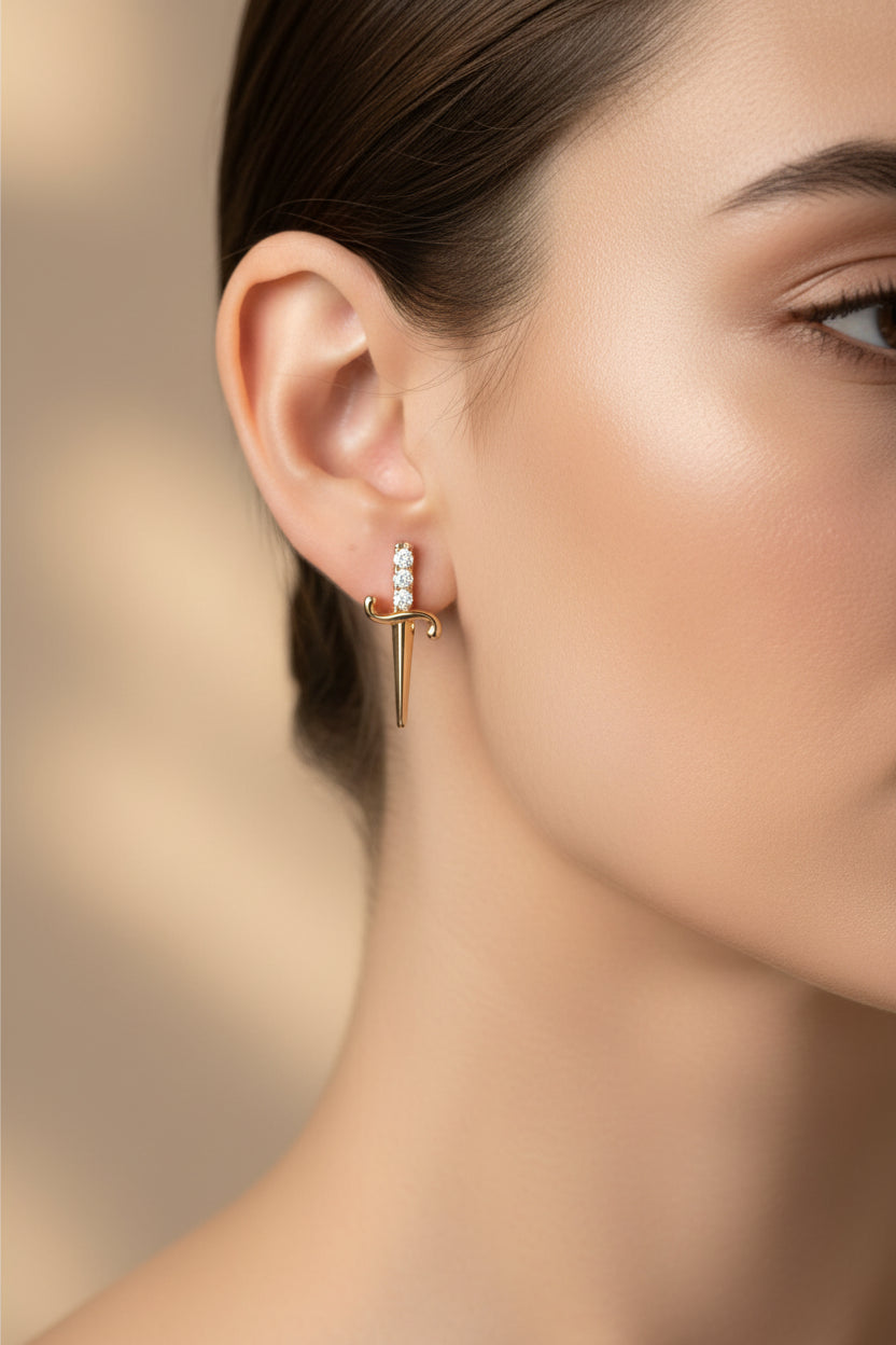 Genuine Diamond and Solid Gold earrings with 'VLOVE' branding on a white background