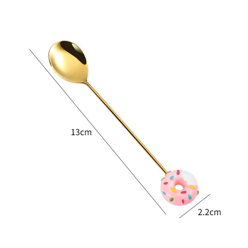 Gold spoon with a donut-shaped handle on a white background, showing measurements. Gold-colored spoons and forks with colorful donut-shaped ends on a pink background teaspoons stirring spoons dessert fork dessert spoon mini utensils miniature fork and spoon set. Cute Donut Scooping Spoon + Fork (Stainless Steel Stirring Spoons Dessert Utensils)