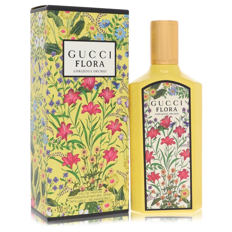 Gucci Flora perfume bottle and packaging with floral design on a white background. Flora Gorgeous Orchid by Gucci Eau De Parfum Spray Refillable 3.3 oz for Women