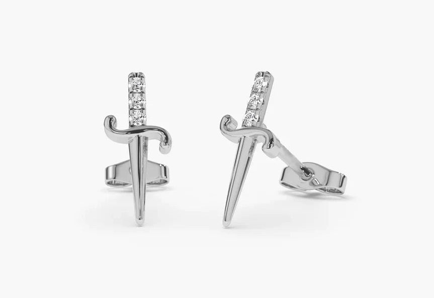 Silver sword-shaped earrings with embedded stones on a white background, featuring the VLOVE brand.