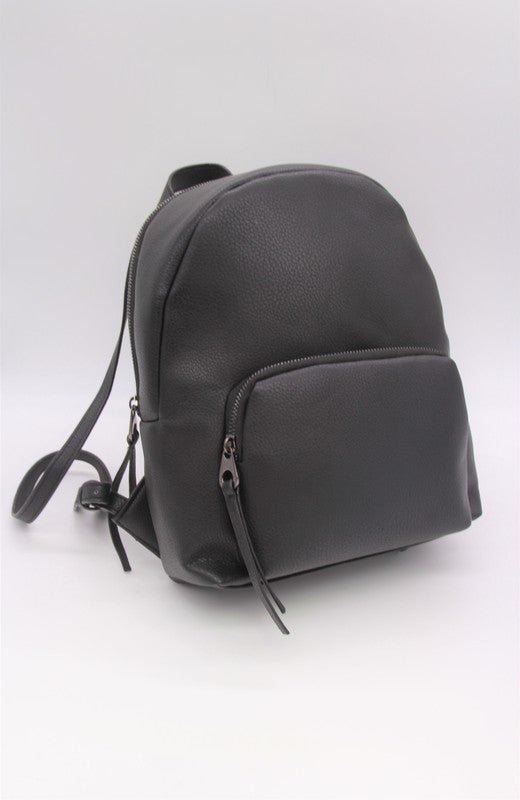 HIGH QUALITY PU LEATHER BLACK BACKPACK Carry your essentials in style with this sleek black PU leather backpack—made for students, commuters, and weekend adventurers. The compact frame keeps your look polished while fitting daily must-haves without the bulk.