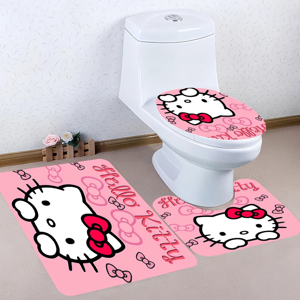 Hello Kitty-themed bathroom set with pink seat cover and rug on a toilet.