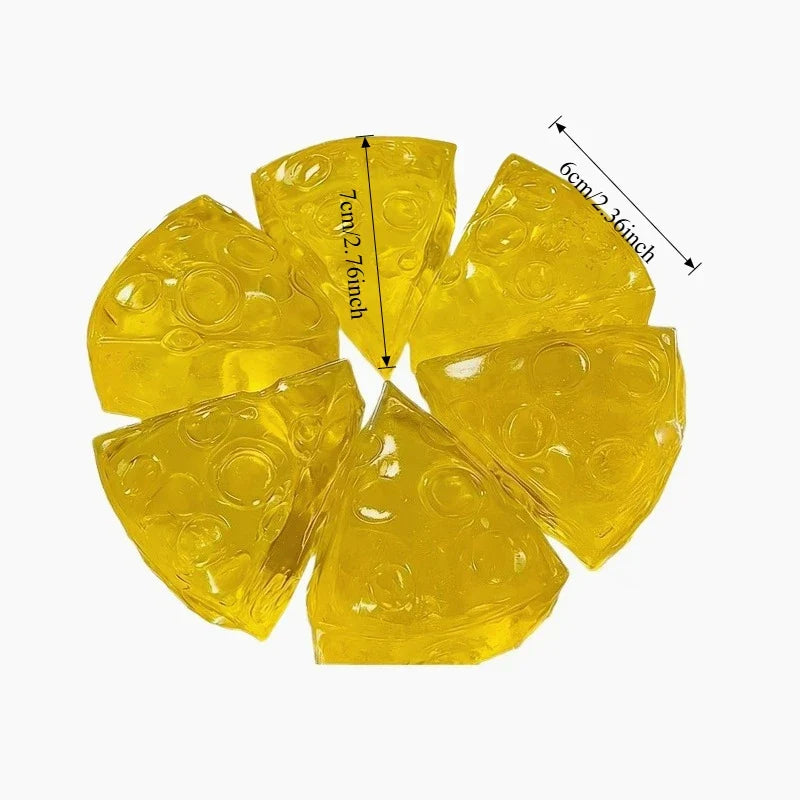 Yellow translucent honey cheese squishy stress relief toy with realistic Swiss cheese texture and visible dimensions (7 cm x 6 cm) displayed on a white background. Perfect soft mochi fidget toy for anxiety relief, sensory play, desk stress relief, party favors, stocking stuffers, classroom rewards, and travel entertainment. Squishy Toy.