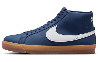 A Nike high-top sneaker in navy blue with a white Swoosh logo and a brown gum sole, shown from a side profile view on a white background.