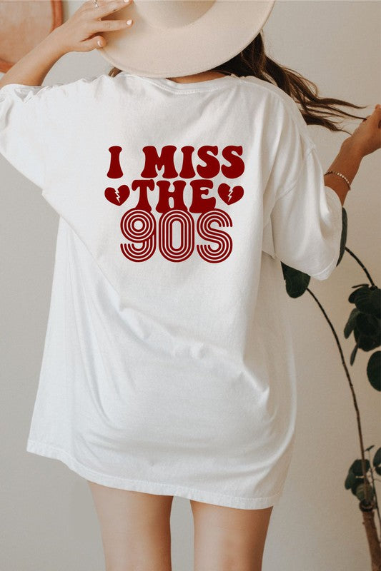 Person wearing a white t-shirt with 'I Miss the 90s' text in red.