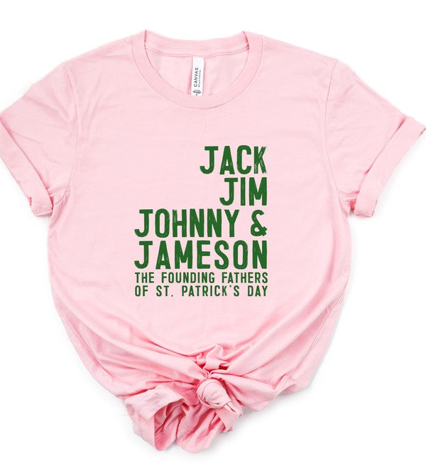 Soft pink graphic T-shirt featuring green "Jack Jim Johnny & Jameson – The Founding Fathers of St. Patrick's Day" text, a funny Irish whiskey-inspired St. Patrick's Day tee made from 100% ringspun cotton.