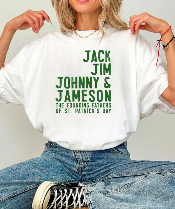 Person wearing a white sweatshirt with green text sitting on the floor.