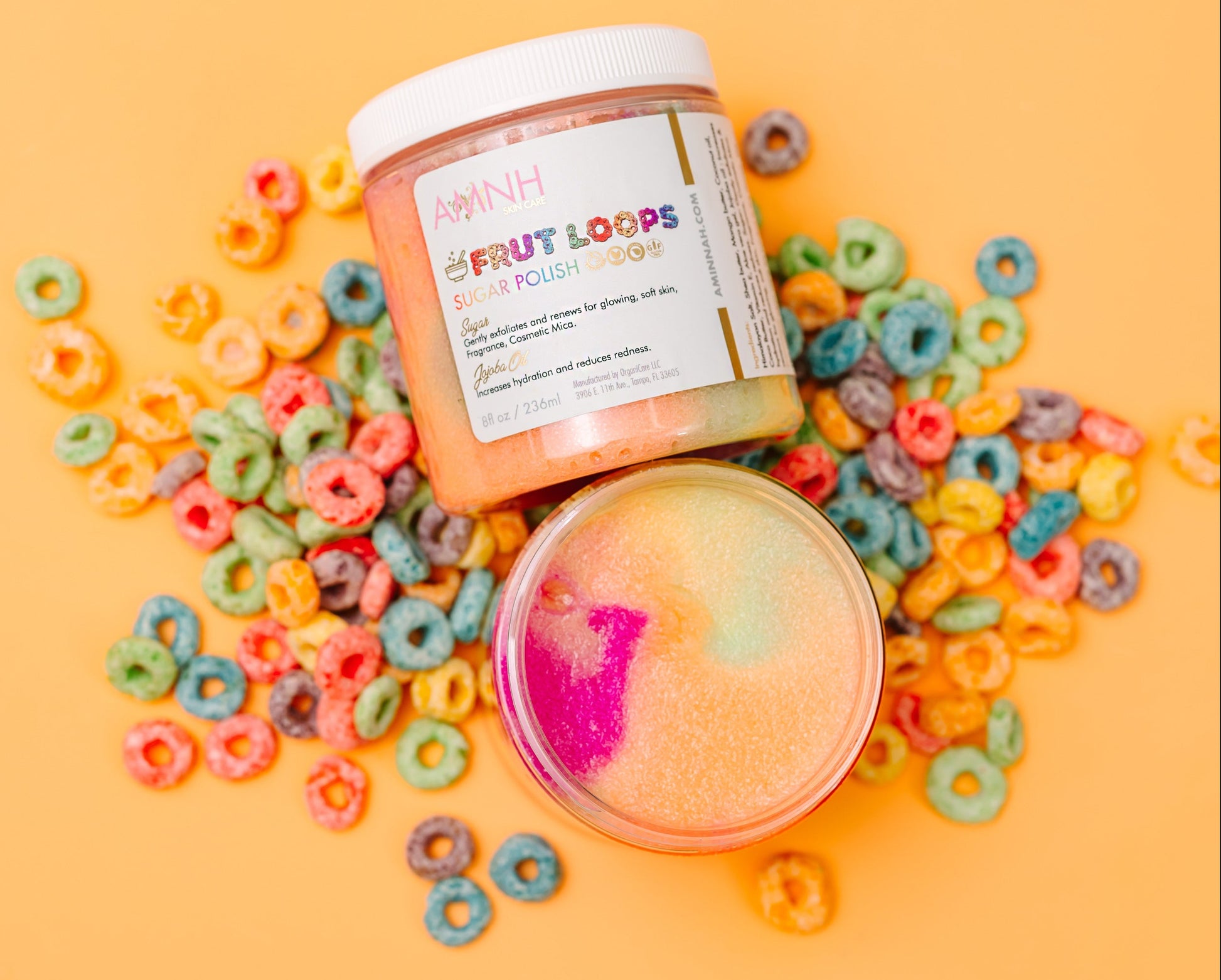 Jar of bath product with colorful cereal loops on a yellow background. Sugar Scrub Body Scrub Bath & Body