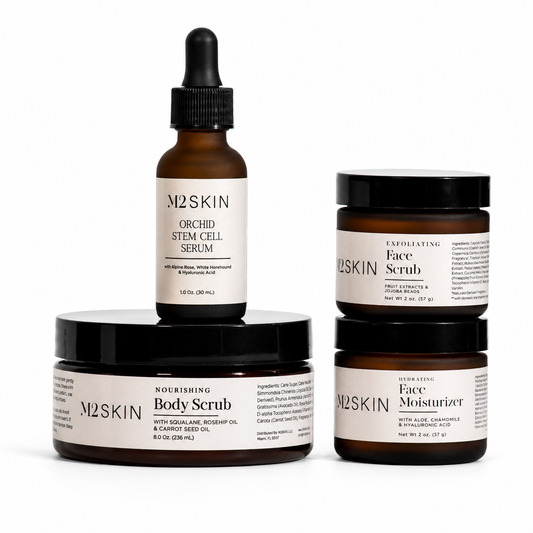 Set of M2SKIN skincare products including serum, scrub, and moisturizer on a white background